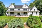 Spectacular Custom-Built Home in an Established Cul-De-SacThis exceptional four-bedroom residence, meticulously crafted by a renowned local builder, offers the perfect blend of luxurious comfort, thoughtful design, and serene outdoor living. The private primary suite boasts dual walk-in closets and a spa-inspired bathroom with a soaking tub. One additional bedroom features its own en-suite bath, while two more bedrooms share a beautifully appointed Jack and Jill bathroom.The main level is designed for seamless living and entertaining, featuring a chefâ€™s kitchen with an oversized center island, a sunlit living room with fireplace, a private home office, and formal dining room. A beautifully appointed back entry with built-in bench seating and dual closetsâ€”perfect for everyday organization, a stylish powder room, and a convenient back staircase.Step outside to your own private retreatâ€” this tree-lined property offers supreme privacy, professionally landscaped grounds, spacious deck, and a gorgeous in-ground pool, perfect for summer relaxation and entertaining.The walk-out basement presents outstanding potential to be finished to suit your needsâ€”whether itâ€™s a home theater, playroom, or guest suite. Upstairs, an unfinished bonus room awaits your visionâ€”ideal yoga/gym space, craft room, or additional workspace. A generous three-car garage completes this truly special offering.With its space, flexibility, timeless design, and resort-like setting, this home checks every box for modern living.
