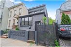 Welcome to 231 Macdougal St â€“ A Modern Two-Family Gem in the Heart of Brooklyn!Step into this beautifully renovated semi-attached two-family home, thoughtfully upgraded from top to bottom. Each unit features two spacious bedrooms and a sleek, modern bathroom ideal for comfortable living or generating rental income. Enjoy the full finished basement, perfect for a home office, gym, or entertainment space. The contemporary kitchens are equipped with stainless steel appliances, quartz countertops, and elegant tile backsplashes offering both style and function. High-end features continue throughout the home, including rich hardwood floors, custom doors, LED recessed lighting, new energy-efficient windows, a brand-new roof, and updated siding. Central air conditioning and in-unit washer/dryer setups provide year-round comfort and convenience. Step outside to a generous backyard an ideal space for entertaining, gardening, or relaxing in your own private oasis. This move-in ready home is a rare opportunity to own a modern, low-maintenance property with thoughtful upgrades in every corner. Donâ€™t miss your chance to make it yours!