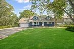 Welcome to this charming Cape Cod, beautifully renovated and set on a tranquil .39 acre lot. This inviting residence features 4 spacious bedrooms and 3 bathrooms with a full basement. The first floor includes radiant heat and elegant wood flooring throughout. With separate entrances to the upper level, there&rsquo;s excellent potential for a mother/daughter suite, pending proper permits. Additional features include a garage and a large driveway. Enjoy year round warmth from the efficient wood burning fireplace that heats the entire space. Conveniently located just minutes from the LIRR train station and Sunrise Highway, commuting is a breeze, and you&rsquo;ll benefit from low property taxes. This extraordinary opportunity awaits, donâ€™t miss out!
