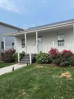 Charming and well-maintained 2-bedroom ranch located in the heart of Hicksville! This cozy home features a living room with hardwood floors, an eat-in kitchen, and a full basement offering plenty of storage or potential additional living space. The private driveway fits multiple cars, and the quiet residential street offers a peaceful retreat while still being close to everything. Conveniently located near schools, shopping, dining, LIRR, and major highways. Low taxes and excellent potential make this an ideal starter home or investment opportunity. Move right in or bring your vision and customize to your taste!
