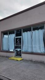 Prime commercial space available for lease in the heart of Valley Stream. Formerly used as a salon, this freestanding corner property offers excellent visibility and foot traffic. Features large front windows, a flexible open layout, private restroom, and one dedicated parking space. Suitable for retail, professional, or service-based businesses. Convenient location near Sunrise Highway, major roadways, and public transportation.