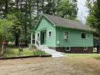 This lovely, move-in ready cottage is perfect for easy living or a weekend getaway. The rear deck overlooks a cozy green haven with its own fire pit and organic garden. There is so much you can do with this property because it is comletely flat. In winter, enjoy seasonal views of Ashokan High Point. This home has had a number of upgrades within the past two years including new kitchen appliances and a completely remodeled bathroom. The walk out first level has more than enough room for storage, a workout room and much more. The addition of a bathroom could easily turn this level into an in-law or guest suite. Minutes from the Ashokan reservoir, the Ashokan Quarry trail, and Tetta&rsquo;s Market, this sweet home will make your upstate dreams come true. And forgot to mention the taxes are very reasonable.