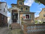 Perfect for investor, this house sits on 2 separate 30x100 lots. You can build a 1500 square foot one family on the extra lot and either keep or sell 33-15 separately.ALL CASH OFFERS ONLY