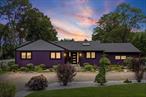 Fully renovated in 2019, this bright and spacious ranch in Islandia/Hauppauge offers over 2, 000 sq ft of modern living on a 0.64-acre fenced lot. Upgrades include new roof, windows, doors, siding, plumbing, electrical, HVAC, and high-end interior finishes throughout. Revel in mealtime prep in this deluxe chef&rsquo;s kitchen, complete with Bertazzoni gas range, stainless steel appliances including vent hood, pot filler faucet, garbage disposal, quartz counters, oversized island with vegetable sink and power, and soft close cabinetry with ample storage. Open-concept kitchen overlooks the expansive single-floor living space with gorgeous crown molding and skylights and two sets of double french doors that bathe the room in natural light. A two-sided gas fireplace grounds the space and helps make this beautifully finished house a home. Other desirable features include central air conditioning, first floor laundry, a primary en suite bathroom, and full basement. Both spa-like bathrooms have showers that are ADA accessible. Open the french doors to the wrap around deck with multiple seating areas for backyard relaxation. This .64 acre property features a single car attached garage, extended driveway with parking for 12+, multiple sheds, automatic opening gate, beautiful landscaping, and room for a pool. This home is ADA accessible and minutes from the LIE and shopping. Bonus spaces are perfect for multi-generational living, guests, or a home officeâ€”truly a must-see! Located in the Hauppauge School District with low taxes and no HOA. Move-in ready and full of possibilities.