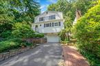 Lovely Mustapick Colonial located in the midst of the Scenic Village of Northport.This property boasts lush tiered grounds, decking, hot tub. Floor to Ceiling brick wood burning fireplace, Large LR/DR featuring slider to deck.3 bedrooms each with California closets, Hardwood Floors throughout .Exquisite Moldings in Living Room, Hallway and Kitchen. Central Air, Pull down attic with ample storage. Central Fire and Burglar Alarm, Oversized 1 car garage with opener.This charming Waterfront Village offers shopping, dining, boat dock , Engelman Theatre.Close to Town Beaches and Beachfront Restaurant.Make the lifestyle and house your next HOME!