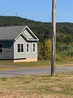 7.5 acre currently 55+ mobile home/trailer park with 32 lots plus a 20x30 store front and a 3 car garage. 16 filled lots, 16 to develop and sell homes, endless possibilities here. Sale includes ownership of 6 homes , 2 of which are 2 family homes. The store is currently vacant, but could rent for $1200/moThe garage is occupied by the on-site manager who lives next door His management fee equals the rent.He can stay on or he will pay rent.Two of the lots are occupied by duplex homes, meaning 4 apartments total. (Double wides that are two families each) They are not finished, but will be finished prior to the closing. Therefore, brand new apartments, each with 1.5 bedrooms, 1 ba, full size laundry room, and central ac. Would expect minimum $1300 each additional rent income ($5200/mo) These are on chassis and axles and can be moved if not wanted. The interior is not finished and can still be changed into a 1-family or a mother daughter arrangement, or they can be left as is for a discount. Whatever the buyer wishes. 8 lots are occupied by Tenant owned homes. Lot rent is 645.00 starting 6/1.Tenants pay their own taxes, water, and utilities.6 lots have park-owned single-wide homes. 5 are rented, one just became vacant and needs to be rehabbed.There is city water and sewer. The Tenants have their own meters from the Village.Natural gas is on site but not currently being used.Current rent roll:Lots 3, 4, 5, 7, 8, 9, 17, & 22 each pay $645.00 + taxâ€™s and utilities.  Total $5, 160.00Lot 19 Park owned and rented $1, 300.00Lot 20 Park owned and rented $1, 325.00Lot 21 Park owned and rented$1, 500.00Lot 23 Park owned In the process of being rehabbed. Can be sold or rented for $14- $1, 500.00 Can be rented prior to closing or left empty for buyer to sell Lot 24 Park owned and rented $1, 125.00Lot 27 Park owned and rented $1, 300.00Garage $645.00       Total $8, 675.00Duplex apartments $1, 300 each X 4    Total $5, 200.00       ______________     Total as is   $19, 082.00Potential additional rent:Store     $1, 200.007 oversize lots @ $700.00 each  Total $4, 900.009 regular lots @ $645.00 each  Total $5, 805.00     ______________ Total potential future rent  $11, 905.00  Total Rent when full at current rent rate   $31, 000.00Sale of 16 new homes with profit of $25, 000.00 each $400, 000     with profit of $30, 000.00 each $480, 000The taxes are about $14, 000 per yearThe insurance is $2, 200 and includes coverage on the park owned homes.Electric for street lights and sewer pumps is a couple hundred a monthPlowing is $150 per plowLawn mowing of common area is $150.00 once each week or two in season. Will go down when the lots are rented. Tenants mow their own. whole package, including the finished duplex homes and 6 double wides included in price. The duplex homes are estimated to be worth $200k each and the package of mobile homes $250k. Total value of homes = $650kClose to beautiful Park on the river with shops, restaurants etc , NYS Thruway etc. Zoned multifamily commercial- to be verified by buyer (agent)