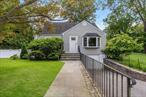 This Rye Neck home is a perfect choice for downsizers or first-time buyers seeking privacy, a patio, and a fenced backyard. Unlike a condo, it offers the freedom of your own outdoor area, including a large, gated backyard that is both pet-friendly and complemented by a sizable side yard. The primary bedroom is conveniently located on the first floor and is paired with an updated hall bathroom. The living room flows seamlessly into an eat-in kitchen, creating an inviting space for daily living. An additional bedroom on the first floor offers flexibility for guests or family. Upstairs, two more bedrooms can easily be used as home offices, accommodating different lifestyle needs. The basement houses the washer and dryer and provides ample space for exercise or a playroom, adding to the home&rsquo;s versatility. The lower level also includes a one-car garage for secure parking. A spacious, gated backyard and a generous side yard make this home especially attractive, offering ample room for pets and outdoor activities.