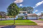 This 3-bedroom, 2-bath Colonial home combines spacious living areas, outdoor entertainment options, and recent upgrades enhances its appeal, while the location in the Smithtown school district adds to its desirability.Major Updates & Energy Savings: New roof (2020), Some downstairs windows replaced (2019), New driveway (2020), Replaced and expanded the drywell for laundry versus cesspool, Leased Sunrun solar panels (through 2034) for reduced electric bills and tax credits, currently $300 per year.Kitchen was renovated in 2019 and with a gas stove featuring 6 burners and peninsula for quick bite to eat, paperwork/homework and room for a kitchen table. Living room and dining room combination with hardwood floors and wood fireplace for those winter nights. A separate den off the kitchen and a full bathroom near by. This leads to an enclosed porch for a reading room, morning coffee and an afternoon wind down.Convenient to highways and local shopping centers. This house is ready to welcome it&rsquo;s new owners.