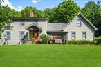 Tucked into a serene enclave on coveted Mount Beacon, this exceptional 4 plus bedroom, 3 bathroom residence offers the perfect blend of privacy, comfort, and refined design-all just minutes from the heart of Beacon. Set on over 3 pristine acres that border protected land, the property is enveloped by a lush canopy of trees, offering year-round natural beauty and a true sense of escape. From the moment you arrive, you&rsquo;re greeted by antique bluestone walkways-sourced directly from Beacon&rsquo;s Historic past-leading to a home that feels both rooted in tradition and refreshingly modern. Step inside to find hardwood floors throughout, high-end finishes, and a thoughtful layout designed for everyday living and effortless entertaining. The main floor features a formal living room anchored by a classic fireplace, perfect for cozy evenings, as well as an elegant dining room for hosting gatherings. The spacious, eat-in kitchen is a showstopper, boasting sleek soapstone countertops, stainless steel appliances, open shelving, and a large walk-in pantry. Whether you&rsquo;re preparing a casual breakfast or a gourmet dinner, this kitchen blends functionality with style. A comfortable family room opens directly onto a generous bluestone patio, where an outdoor fireplace, hot tub, and retractable awning create a resort-like setting for relaxation and entertaining under the stars. Upstairs, the primary suite offers a peaceful retreat with a walk-in closet and a beautifully appointed ensuite bath. Three additional bedrooms and another full bath provide flexible space for work, guests, or creative pursuits. Additional highlights include an unfinished walk-out basement ready for future expansion, four zone heating, central air conditioning, and a custom built shed for storage. Rarely does a home come to the market that so perfectly balances natural surroundings with polished interiors. Whether you&rsquo;re sipping coffee on the patio or exploring the surrounding trails, this Beacon gem invites you to slow down and savor the best of Hudson Valley living. All this just a few minutes from Beacon&rsquo;s vibrant Art/Cultural scene at Dia Museum etc., it&rsquo;s Main Street shops and restaurants, the Metro North Train taking you to Manhattan in 1 hour 15 minutes, The Hudson River kyak rentals at Long Dock park and so much more. Schedule your private showing today and experience this one-of-a-kind property.