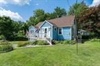 Tucked away on a peaceful cul-de-sac with lake views and private lake access, this 3-bedroom Cape offers classic charm, thoughtful updates, and an unbeatable Mahopac location. Whether you&rsquo;re looking for a weekend escape or a full-time home, this one delivers. Inside, the flexible layout features two first-floor bedrooms and a full bath, an efficient galley kitchen with stainless steel appliances, and an inviting entrance foyer that sets the tone. Upstairs, one additional bedroom and a partially finished attic provide room to grow or work from home. Enjoy morning coffee or evening sunsets from your front porch or back patio, taking in seasonal lake views that elevate daily living. A full, unfinished basement and attached one-car garage offer plenty of storage or future expansion potential. Located in a community with lake privileges and a private clubhouse, you&rsquo;re just minutes from shops, dining, and top-rated Mahopac schools. This is a rare opportunity to live the lake life without the premium price, donâ€™t miss it. Open House Attendees: Please park by the clubhouse.
