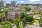 Welcome to this Spacious Junior 4 apartment Located in the beautifully maintained Bell Apartments Cooperative. This unit features a very large foyer with a walk in closet. The French doors lead you into a spacious living room and dining room. The eat-in kitchen is updated with stainless steel appliances,  Granite counter tops and a window overlooking the grounds. The Large windows offer a ton of natural light and view of the gardens. The King-sized Bedroom offers ample closet space. The unit has a windowed and updated bathroom that offers a modern feel. Offering ample closet space and hard wood floors throughout, enjoy the convenience of central air and heat, your own reserved parking spot and nearby express bus to Manhattan, LIRR, Bay Terrace Shopping Center, dining, Common point Queens Bay Terrace Pool and Athletic Complex and more.