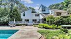 First time on the market! This house is a WOW for water enthusiasts, entertainers, and nature lovers! Custom built, contemporary waterfront retreat with in-ground pool and private boat dock. Perfectly nestled on an expansive lot in the private enclave of Baywood in East Moriches. Surrounded by lush, natural beauty and offering direct water access from your backyard. This one-of-a kind property is a serene escape and begins as you enter the property through iron gates and meander down the belgian block, bluestone driveway. This immaculately maintained contemporary boasts an open concept layout with oversized sliding glass doors, bringing the beauty of the setting indoors. Outside is your own private oasis with an oversized swimming pool with stone patio surround and a wrap around deck for entertaining or simply enjoying the view. The screened-in porch is a favorite spot to begin and end the day. Upstairs, the primary suite offers a private terrace and ensuite bathroom. A total of 4 generously sized bedrooms and a bonus office/loft space offer plenty of room for guests. Full basement, attached 2 car garage and numerous capital improvements make this a rare find. Baywood is a private community with a gated waterfront park exclusive to residents. East Moriches School District with your choice of high schools. Located 70 miles from Manhattan and minutes to the Hamptons. Grab the opportunity for waterfront living in this sought after location. High elevation and NOT in a flood zone. 2023 New HVAC, HWH, Oil Burners