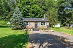 Charming, fully updated 3-bed, 1-bath ranch in tranquil Pine Bush! Nestled on a spacious 0.45-acre lot, this lovingly renovated 953 sq ft one-story home offers ideal single-level living. A complete 2025 makeover includes new flooring, fresh paint, modern windows, updated bathroom fixtures, and a welcoming front deck.Step inside to discover a bright, eat-in kitchen, cozy living areas with contemporary finishesPerfect for both families and downsizers, the spacious lot offers room for gardening, outdoor entertainment, or even a dream expansion. With Pine Bush schools nearby and charming local amenities just minutes away, this affordable gem delivers both convenience and quiet retreat