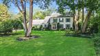 Welcome to this beautifully maintained 4-bedroom, 2.5-bath Central Hall Colonial, gracefully situated on a pristine 0.7-acre lot of park-like grounds. This inviting home offers the perfect blend of elegance, comfort, and modern convenience.The first floor features a formal living room and a formal dining roomâ€”ideal for entertainingâ€”along with a stunning chefâ€™s kitchen equipped with cherry cabinetry, stainless steel appliances, a center island, radiant heat flooring, and stylish pendant lighting. A cozy family room boasts a classic brick wood-burning fireplace and built-in cabinetry, while the spacious laundry room includes a washer, dryer, and custom storage cabinets.Upstairs, you&rsquo;ll find a luxurious en-suite primary bedroom with dual his-and-hers closets and a private bathroom. Three additional generously sized bedrooms and a full bath with a relaxing jacuzzi tub complete the second floor.Throughout the home, gleaming hardwood floors add warmth and character. Additional features include central air conditioning, a full basement, a 2.5-car garage, and a large driveway for ample parking.Step outside to your private backyard oasisâ€”featuring a 20x40 saltwater inground pool, wraparound paver patio, and a fully equipped outdoor kitchen with bar seating, refrigerator, built-in grill, and BBQ. A charming garden pergola adds a touch of serenity to this perfect outdoor retreat.This home truly has it allâ€”space, style, and outdoor luxury. Don&rsquo;t miss the opportunity to make it yours!