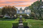 Donâ€™t miss the chance to own this exceptional home in one of Clarkstownâ€™s most coveted neighborhoods!Step into timeless elegance in the highly sought-after Waters Edge community with this classic center-hall colonial, perfectly set on a beautifully landscaped, picturesque lot. Built in 1990 and lovingly maintained ever since, this residence blends space, style, and comfort in every detail.Offering 2, 928 sq. ft. of thoughtfully designed living space, this home is ideal for both relaxed everyday living and joyful entertaining. The inviting lemonade porch is the perfect spot for peaceful afternoons, while the oversized, sun-drenched eat-in kitchenâ€”featuring a large center islandâ€”flows seamlessly to the expansive, serene backyard and large Trex deck, perfect for outdoor dining and gatherings.Just off the kitchen, a step-down den with a cozy fireplace sets the scene for intimate evenings, while the sun-filled living roomâ€”with its decorative fireplaceâ€”offers a warm and welcoming place to unwind. The spacious dining room, adorned with crown molding, is ready to host your most memorable celebrations.A full basement with a wet bar provides endless possibilities for entertainment and recreation. Every room reflects pride of ownership and features high-end finishes that enhance the homeâ€™s inviting character.(Additional photos coming soon!)