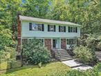 Tucked away in Cortlandt Manor in the Hendrick Hudson School System, nestled on a hill above a quiet, tree lined street is this spacious, classic 4BR, 3 1/2 BTH colonial. This property offers a rare blend of space, character, and comfort on nearly an acre of private land. Built in 1971 and thoughtfully maintained, the home retains its original charm while offering the practical updates todayâ€™s homeowners appreciateâ€”like multi zoned central air conditioning, central vacuum, a freshly painted interior and exterior as well as beautifully buffed and shined hardwood floors throughout. Whether youâ€™re looking to settle into a quieter lifestyle or simply enjoy more room to grow, this home offers the perfect balance of convenience and tranquility. Step inside to a welcoming and well-designed layout featuring a spacious living room with a large bay window and large, brick, wood-burning fireplace. The formal dining room, also with an oversized bay window, offers abundant natural light, perfect for gatherings. The heart of the home is the expansive, eat-in chefâ€™s kitchen with generous prep space, a convenient powder room and direct access to the full-length Trex deck, ideal for entertaining or enjoying quiet evenings surrounded by nature. Upstairs, the serene primary suite includes a walk in closet and a full private bath with a shower/tub combination. Three additional bedrooms offer ample closet space and share a full hallway bathroom with classic tub and shower. Access to your large attic space. Every room reflects the homeâ€™s warmth and thoughtful care, not to mention you may feel like you are waking up in your own private treehouse from all of the bedrooms. The finished lower level adds flexible space that can serve as a workout area, yoga studio, pantry, office, or media room along with a third full bathroom. It also includes a laundry area and interior access to the oversized two-car garage, offering plenty of room for storage or hobby space. Savor endless summer gatherings on your private Trex deck, overlooking a beautifully landscaped backyardâ€”your own peaceful retreat where nature invites exploration. A spacious, newly fenced enchanted garden awaits, thoughtfully designed for homesteading and outdoor living. Located in a quiet, established neighborhood, this home is just minutes from local schools, shops, and essential services. Itâ€™s also a commuterâ€™s dream with quick access to the Taconic State Parkway and three nearby Metro-North stations. Local Highlights within and around Cortlandt Manor: Charles J. Cook Recreation Center & Pool, Croton Gorge Park & New Croton Dam, Cortlandt Waterfront Park, Hudson Highlands Gateway Park, Cortlandt Town Center. Nearby Southern Westchester Attractions: Untermyer Gardens (Yonkers), Tibbetts Brook Park, Rockefeller State Park Preserve, Philipsburg Manor & Historic Sleepy Hollow. The charming Rivertowns: Tarrytown, Irvington & Crotonville, The Bronx Zoo, New York Botanical Gardens. With a perfect mix of natural beauty, community amenities, and easy access to the best of the Hudson Valley, this home invites you to create your next chapter.