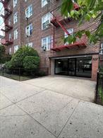 Welcome to this move-in ready 1 BR coop with Manhattan views in the heart of Jackson Heights. This sun drenched, freshly painted home boasts a thoughtful layout, generous proportions and hardwood floors throughout. The welcoming dining area is complete with a bifold closet. To the left, an updated windowed galley kitchen with lots of cabinetry, counterspace and SS appliances. The bright and spacious Living room, with a Manhattan view, offers great space for entertaining and everyday comfort. The King size bedroom offers ample closet space and dual exposures, filling the room with natural light The windowed bathroom has the convenience of a bathtub. Monthly maintenance covers all utilities, electricity, gas, taxes, heat and hot water. Enjoy access to a Fitness center, peaceful courtyards and gardens, laundry room facilities, and storage room. The key fob system provides secure access to your building and common areas. Parking is available via waitlist. The neighborhood is diverse and vibrant. This superb location offers proximity to multicultural restaurants, shopping, bus and subway options, as well as a short commute to LGA airport, major highways, and Flushing Meadow Park.