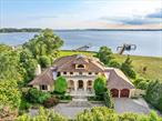 Waterfront Living: Perfected.Custom built 21-years-young Colonial is at once grand and intimate, spacious (6554 sf) yet comfortable, and with every desired amenity. Sited on exquisitely landscaped 1.25 acre property, with pool, leading to 164&rsquo; beach with private dock. Sold fully furnished. Everything about this offering says luxury and quality.