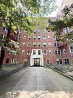 Prime Flushing Location â€“ 41 Ave  Spacious 2-Bedroom Co-op (Approx. 1, 000 Sq Ft)Highlights: 1. South-North exposure with abundant natural sunlight and excellent cross ventilation 2. Windowed kitchen and bathroom for optimal light and air flow 3. Formal two-bedroom layout with flexible and practical design 4. Well-maintained condition â€” move-in ready 5.Eligible for out-of-state children purchasing for parents 5. Convenient location: short walk to subway, supermarkets, and restaurants; Maintenance: $1, 039.58/month (includes water and heat)