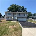 Renovated Hi Ranch, New Roof, Siding, Windows, Doors, Kitchen, Baths, Asphalt Driveway, Brick Stoop and More. 100x100 Property Quiet Mid Block Location.