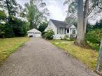 3 br expanded cape pine floors full finished basement extended kitchen 2 large detached cedar built solid garageYour shance to own a piece of history. Home was built and inhabited by WW2 Vets Annie Henry- Who in honor had the street named after