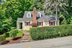 Welcome to this charming Cape Cod gem, perfectly situated in a serene neighborhood that seamlessly blends tranquility with convenience. Just a brief stroll away, you&rsquo;ll find local shops and the Metro North train, providing a quick 36-minute ride to Manhattan. Plus, enjoy easy access to major highways for all your adventures.Step inside to discover a warm and inviting first floor, featuring a cozy living room with a wood-burning fireplace, a dining area with counter seating for two, and a well-appointed kitchen boasting brand-new stainless steel appliances and granite countertops. The first floor also includes a bedroom with a convenient half-bathroom. Venture upstairs to find a spacious oversized bedroom, which offers the potential to be divided into two separate rooms, and a full bathroom that caters to all your needs. Outside, your personal oasis awaits with a stone patio perfect for entertaining, a flat grassy area, and ample space for gardening. The freshly painted interiors and hardwood floors throughout create a bright and welcoming canvas ready for your personal touch.Additional features include a Tesla charger and a new oil tank. Don&rsquo;t miss the opportunity to make this delightful home your own!