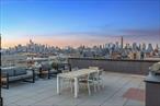 Step into a truly rare offering. A stunning corner unit with a wraparound balcony showcasing unobstructed panoramic views of the Statue of Liberty, Upper New York Bay, and the skyline stretching from Downtown Brooklyn to Manhattan and Staten Island. This is not just a home. It&rsquo;s a front-row seat to the city&rsquo;s most iconic landmarks.From the moment you enter, you&rsquo;re welcomed by imported Italian floor-to-ceiling, double-paned, noise-isolating windows that flood the space with natural light while offering serene privacy. The warm tones of 7-inch wide-plank European oak engineered wood floors set the stage for refined living, while the multi-zone, energy-efficient heating and cooling system allows for personalized climate control in every room.To your left, a chef&rsquo;s dream awaits. Custom walnut kitchen outfitted with Alleanza quartz countertops and full-height backsplash, paired beautifully with a suite of premium Thermador and Bosch appliances. The layout offers an abundance of closet space, ensuring seamless storage without compromising style.The spa-like bathroom is adorned with Dolomiti marble tile walls and slab countertops, complemented by a custom oak vanity. A blend of elegance and function.Beyond the home itself that comes with a private parking space, and a personal storage locker. This building is a one-stop shop for luxury living. Enjoy exclusive access to an array of thoughtfully curated amenities: a private music room, on-site daycare center, yoga room, gym, quiet room, and a community terrace ideal for relaxing or socializing. Along with an incredible rooftop oasis featuring a grilling station, outdoor shower, and 360 views of the cityscape and harbor. If you&rsquo;re seeking luxury, lifestyle, and value. This is your chance to own a piece of New Yorkâ€™s skyline at an aggressive price point. Opportunities like this donâ€™t come often.