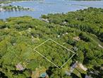 Design Your Luxury Island Estate.Seize the rare opportunity to create your custom dream home on this pristine, level lot nestled in one of Shelter Islandâ€™s most desirable locations. Moments from the serene shores of Crescent Beach and the tranquil waters of Wades Beach, this property offers both privacy and proximity to the best of island living.Enjoy effortless access to Sunset Beachâ€™s vibrant waterfront dining, the Shelter Island Yacht Club, and charming boutiques in the village. Whether you envision a sophisticated summer retreat or a year-round sanctuary, this parcel offers the canvas to build a legacy home tailored to your lifestyle.The seller will provide Suffolk County Board of Health (SCBoH) approval for the sanitary system. Building permits are requiredâ€”please consult with the Town of Shelter Island for guidance specific to your plans.A motivated seller invites serious inquiriesâ€”build your legacy on Shelter Island.