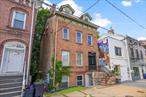 Handsome brick Victorian Beauty on Newburgh&rsquo;s famous Liberty St! This multifamily has 2 spacious duplexes currently with a vacant lower level apt creating an ideal opportunity for either an investor to find their ideal rental/tenant situation or an owner occupant. This first floor duplex has the only access to the rear garden with the living/kitchen and laundry area opening out on to the back garden so an owner occupant can live on first 2 floors, and collect rent to offset their costs from the apt on the top 2 floors. This solid building is Ideally located only steps from Broadway and short walking distance to all the cafes, restaurants and bars on Liberty Street, and just a stroll down the hill to Waterfront dining on the Hudson River. Dont miss this great affordable opportunity to join the Newburgh community and renaissance in a fabulous location!