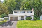 Pride of ownership is evident from the moment you arrive at this immaculately maintained residence. This completely turnkey 4-bedroom, 2.5-bath Colonial is in the heart of Barclay Heights, a wonderful neighborhood just a 2 minute drive into Saugerties Village. Meticulously cared for and recently updated, this home is neat as a pin and ready for its next chapter. All four bedrooms are generously sized with ample closet space, including a spacious primary suite featuring an en suite bath and a large walk-in.The original hardwood floors have been beautifully refinished, the entire interior has been freshly painted, and the bathrooms have been thoughtfully updated. Enjoy afternoons barbecuing on the back patio, bordered by nature, and cozy evenings by the gas fireplace in the inviting living room.In addition to the 2 car garage (with plenty of space for storage or hobbies), there is a very clean, dry basement with incredible potential - it would be a perfect playroom, gym, office, etc. This is truly a wonderful place to call home.