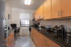 Why rent when you can own for less?With 20% down, your monthly payment to own this fetching apartment, before tax breaks, would be less than $2, 200. And every month you pay your rent, you invest in yourself and build your own equity!!This immaculately maintained one-bedroom coop features a stylishly undated kitchen and bath, and the low Maintenance of $881 per month includes both cooking gas and electricity! It comes with a parking permit, affording access to outdoor parking lots in the rear of the building, for only $25 a month.Step into this move-in ready, 5th Floor co-op, and you will be greeted by welcoming sunlight from morning to late-afternoon. The entry to this apartment features ample space for a dining table or home-office. The renovated eat-in-kitchen features custom cabinetry, stainless steel appliances, black granite counter-tops with imported tile black-splash, and room for a breakfast table. The quiet corner bedroom, with windows facing East and North, has a large double closet, and enough space for a King-sized bed, dressers, and a desk. The bath has also been renovated, with variegated quartz wall tiles, and features a walk-in shower with added wall-mounted storage / bench.Although covered in wall-to-wall carpeting now, the floors throughout this unit are oak, laid in a parquet pattern. Remove the carpeting, and they will need a quick cleaning to shine in the sunlight. Although only a one-bedroom, this apartment also features five spacious closets, and there is available storage and a bike room in the lower level. There are also laundry rooms, party rooms, and a gym, on the same level, as well as two convenient ramps for wheeling your groceries, packages, etc. into the building.Mitchell Gardens 3 is known as one of the most well-run and financially solid co-ops in all of Queens. Composed of six free-standing buildings, with over 500 units, it has a full-service staff of Superintendents, Porters, and an onsite Management Office. When it comes to convenience, its location in the prime Mitchell-Linden is ideal.Situated off of the Eastern side of the Whitestone Expressway, Mitchell-Linden is an ideal neighborhood for commuters, with express buses to Manhattan, and easy access to highways. It&rsquo;s convenience for local residents is underscored by its Walk Score of 86!This area is near Citi Field, Flushing Meadows Corona Park, Queens Botanical Garden, and the scenic shores of Flushing Bay. It is a ten minute walk to three shopping centers, with grocery stores, restaurants, and merchants providing a wide variety of products and services, public and private schools, the Queens Public Library, and about 20 minutes to the bustling Downtown Flushing business district.Sorry but no subletting is allowed at Mitchell Gardens, and no dogs are allowed either. Indoor parking is currently on a waiting list, but storage and bike parking is available when you move in.