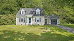 Welcome to this beautifully completely renovated meticulously maintained 1941 Cape, located just minutes from the heart of Litchfield and everything Litchfield County has to offer. This charming 2 bedroom, 1 bath home blends classic character with modern updates, creating the perfect full-time residence or weekend retreat. Step inside to discover a spacious open floor plan that offers seamless flow, ideal for entertaining or cozy nights at home. The cozy living room features a wood-burning fireplace with a wood stove insert. The renovated eat-in kitchen boasts custom cabinetry, leathered granite countertops, and stainless steel appliances, all leading to a large back deck where you can unwind and take in peaceful views. The home offers two bedrooms: a spacious upper-level primary suite with a large walk-in closet and custom full bath, and a second bedroom on the main level-perfect for guests or a home office. Beautiful hardwood floors run throughout, and a 2-car attached garage provides direct access into the kitchen for added convenience. Enjoy the best of Litchfield County living-just minutes to acclaimed restaurants, boutique shops, art galleries, vineyards, breweries, and outdoor recreation including lakes, rivers, and thousands of acres of hiking trails. Mohawk Mountain Ski Area is just 15 minutes away, and NYC is an easy two-hour drive. This is a move-in ready, turnkey opportunity to enjoy the beauty, charm, and adventure of the Litchfield Hills year-round.