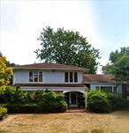 Beautiful splanch on a quiet cul-de-sac in village of Lawrence. 4 Bedrooms 3 full baths, Spacious den with sliding doors overlooking oversized property.,