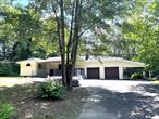 This spectacular Ranch Home is perfect for a mother-daughter setup and offers plenty of space! Recently updated, it features a brand-new kitchen with modern appliances and a pantry, renovated bathrooms, wood floors, and tiled kitchen and baths. Relax by the cozy fireplace or enjoy the spacious family room. Thereâ€™s even a separate area with a summer kitchen, great for hosting guests! The deck overlooks a pool-ready yard, and the charming covered front porch adds extra appeal. Conveniently located just 5 minutes from shopping and major roads and only 15 minutes to Metro North, this home wonâ€™t be available for longâ€”donâ€™t miss out!