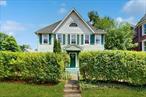 Discover the character and charm of this beautifully updated Victorian home at 1192 North Avenue, Beacon, NY. With a generous 3, 424 square feet of living space, this residence offers four bedrooms, one full bath on the second floor, and a newly added full bath on the first floor, making it ideal for comfortable living and entertaining. Its prime location is perfect for commuters, offering the convenience of walking to the train while enjoying all that Beacon has to offer.The first floor welcomes you with a living room, dining room, kitchen, and a cozy reading room, creating perfect spaces for relaxation and gatherings. The dining room features a hand-painted mural and elegant French doors that open to the backyard, seamlessly blending indoor and outdoor living. Upon entering, you&rsquo;ll be greeted by stunning hardwood floors that extend throughout the home, enhancing its elegant atmosphere. The potential is vast, with opportunities to expand the kitchen into the spacious backyard or transform the second-floor primary bedroom into a luxurious suite by integrating adjacent rooms.The home also includes a versatile walk-up attic, perfect for conversion into a primary suite, additional bedroom, office, or entertainment area. The finished basement provides an area for hobbies, a playroom, or an office. Outside, enjoy your private fenced backyard space, ideal for relaxation or entertaining guests. The front of the home is complemented by privacy bushes that shield you from road activity on 9D/North Avenue, enhancing the sense of seclusion and tranquility.Parking is easy with a convenient driveway located on Mackin Avenue, avoiding the bustle of North Avenue. This home harmonizes historical charm with modern updates in a serene setting, awaiting your personal touch.