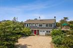 Welcome to 196 Dune Rd., a designer renovated, immaculate beach house with a private path to the ocean and magnificent bay views. Lush landscaping surrounds the heated pool and spa providing a private oasis for swimming and relaxing. Expansive decks offer the perfect setting for al fresco dining with magnificent sunset views. The house includes five bedrooms (two en-suite), four and one-half baths, living room with fireplace, dining area, and kitchen. Also a spacious light-filled enclosed porch for your morning coffee or evening read, and a den/office for those work-from-home days. This coveted beachfront location is less than two hours from NYC, and minutes to Gabreski Airport, the Jitney, train, and the great restaurants and shops in the Villages of Quogue and Westhampton Beach.