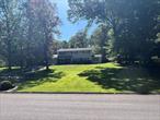 Walk into this immaculate, beautiful home sitting on a huge park like property. This well maintained home features many updates, including an extra playroom, and master bathroom ! Very LOW taxes. This is a MUST SEE