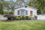 Fantistic Opportunity To Purchase A Home In The Highly Sought After Shoreham- Wading River School District At An Affordable Price And Reasonable Taxes, Plus A Wonderful Quiet, Yet Convenient Location On A Lovely Tree Lined Neighborhood Street Close To Major Roadways, Route 25A Shopping & Schools, Close To Wildwood State Park & Long Island Sound Beaches, And Only A Short Drive To The Farmstands, Vineyards, Championship Golf Courses, Tanger Outlet Mall & Quaint Towns Of The Bucolic North Fork! Beginning With Beautiful Curb Appeal...Wrapped In Tall Privacy/Shade Trees & Lovely Mature Landscape, An Oversized Four Car Belgium Block Lined Driveway Leads To Front Door And Upon Entering The Home You Are Greeted By A Light & Bright, Warm & Inviting Floorplan...A Welcoming Formal Entrance Foyer Offers Ceramic Tile Floors, An Oversized Coat Closet, And Opens Into The Formal Living Room, Kitchen & The Stairway To The Basement/Lower Level. The Welcoming, Elegant Formal Living Room Offers A Beautiful Large Bay Window For Natural Light, Hardwood Floors, Ample Room For A Large Living Room Set/Furniture, And Opens Into The Formal Dining Room. The Comfortable Formal Dining Room Offers Ample Room For A Good Sized Table & Chairs, Room For Entertaining Family & Friends, Hardwood Floors, Lovely Chandelier, Sliding Doors To A Large Deck & The Backyard, And Opens Into The Kitchen. The Beautifully Renovated, Cabinet Lined Kitchen Offers Walls Of Custom Cabinetry With Lovely Crown Moldings & Details, Granite Countertops With A Corner Undermount Sink , Tiled Backsplash, Stainless Steel Appliances (Samsung French Door Refrigerator With Two Drawer Bottom Freezer, Water & Ice Maker, Ceramic Top Stove, Samsung Built In Microwave Oven & GE Dishwasher), Built In Pantry, Ceramic Tile Floors, Recessed Lighting & A Large Window For Natural Light. The Lovely Hallway To The Bedrooms Offers Hardwood Floors, A Linen Closet & Pull Down Attic Storage And Leads To Three Nicely Sized Bedrooms & A Full/Guest Bathroom...The Inviting, Well Sized Primary Bedroom Offers Hardwood Floors, Two Corner Windows For An Abundance Of Natural Light, Double Sized Mirrored Closet, Ceiling Fan & Ample Room For A Good Sized Bedroom Set/Furniture, The First Guest Bedroom Is Well Sized Offering Hardwood Floors, A Large Window For Natural Light, Good Sized Closet, Ceiling Fan & Ample Room For Furniture, The Second, Larger Guest Bedroom Offers Hardwood Floors, Chair Railings, Two Corner Windows For Natural Light, Ceiling Fan, A Good Sized Closet & Ample Room For Furniture, And The Lovely Upgraded Hallway/Guest Bathroom Offers A Modern Vanity, Upgraded Fixtures, Wainscoted Walls And A Full Bathtub With Al Styled Fiberglass Walls/Tub Surround. The Full, Large Basement Offers Many Possibilities For Creating Additional Living Space, Lots Of Storage Space, Utilities (Heating System, Hot Water Heater & Oil Tank), Washer & Dryer And An Outside Entrance & The Fully Fenced (PVC Fencing Front Sides) Large Backyard Offers A 15&rsquo;3 x 15&rsquo;2 Deck For Barbequing & Entertaining, And Ample Room For An In Ground Pool. Additional Features Include: Raised Panel Doors, Updated Windows, Architectural Roof & Electric Panel, And An ADT Alarm System With Cameras. True Taxes (Without Any Exemptions) Are: $9269.75. Hurry To See This Lovely Home & Wonderful Convenient Location In The Top Rated Shoreham - Wading River School District Before It&rsquo;s Gone!