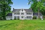 Charming Colonial with 4 Bedrooms on Nearly an Acre â€“ Prime Location! Welcome to this beautifully maintained Colonial-style home nestled on agenerous 0.92-acre lot, offering space, comfort, and convenience. This freshly painted home features 4 spacious bedrooms, 2 full bathrooms, and a versatile layout perfect for modern living. The first floor boasts gleaming hardwood floors, a warm wood kitchen with tiled countertops, aformal dining room, and a massive living room with windows all around, flooding the space with natural light. You&rsquo;ll also find a cozy family room, a private office, and a full bathroom, along with a walkout door leading to a nice patio and the backyard â€“ perfect for indoor-outdoor living andentertaining. Upstairs, youâ€™ll find brand-new carpeting throughout, including in the expansive master bedroom with a huge walk-in closet. Threeadditional generously sized bedrooms and a full bathroom complete the second level. Thereâ€™s also an unfinished attic with pull-down stairs, offering potential for future expansion or ample storage. Additional features include an unfinished basement, window A/C units, a 2-car garage, and a long driveway with plenty of parking space. Step outside to enjoy the in-ground pool, which is fully fenced for safety, a playground area, and a spacious backyard ready for gatherings or quiet relaxation. Ideally located right off the highway, this home offers an easy commute whilestill providing the peace and privacy of a suburban setting. Don&rsquo;t miss the opportunity to own this spacious and versatile home â€“ perfect forfamilies, work-from-home lifestyles, or anyone looking for comfort and convenience in one package!