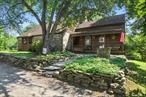Own a Timeless Piece of Historic New Paltz with this exquisitely restored 1797 stone & cedar farmhouse nestled on 7.58 sprawling acres. Impeccably preserved original details include wide plank floors, soaring beamed ceilings, two charming original fireplaces blend seamlessly with thoughtful modern updates to create a truly one-of-a-kind estate.The inviting front porch overlooks an authentic stone well, offering the perfect setting to relax and soak in the peaceful rural surroundings. Inside, a spacious sitting room centers around a original stone fireplace, ideal for cozy evenings with a book. Sunlight floods the living area through expansive glass sliders that open to a sprawling back deck, perfect for entertaining or quiet mornings.The chefâ€™s kitchen is a masterpiece of form and function, featuring quartz countertops, a generous center island & updated appliances. A dedicated dining area sets the stage for elegant gatherings. A fully renovated, spa-inspired bathroom on the first floor offers the perfect blend of convenience and sophistication.Upstairs, three generously sized bedrooms each tell their own story with unique architectural details, complemented by a centrally located bathroom. A spacious hallway sitting area creates an ideal nook for reading or a serene workspace. The expansive primary bedroom provides abundant space and tranquility.Step outside to discover your private oasis: an inviting in-ground pool with cabana, set against panoramic views of lush lawn and a serene pond. The property boasts majestic trees and ample space for gardening. A restored 3-car garage/barn, is ready for use & completes the estate.Over the years updates include a new roof, modern electrical and energy efficient heating systems, refinished floors, updated kitchen and moreâ€”melding historic charm with todayâ€™s comforts.This captivating country estate is the perfect sanctuary for your forever homeâ€”where timeless charm meets modern luxury and every corner tells a story.