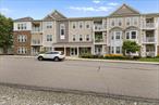 The Retreat in Carmel, an active 55+ community, boasts a maintenance free lifestyle. The unit is located on the 3rd floor (elevator in bldg) and has indoor heated parking garage (1 space). There are 2 bedrooms, 2 baths. The primary bathroom contains a large soaking tub, double vanity sink, shower and a water closet. There is also a large walk-in closet. The covered balcony is off the living room. The clubhouse is minutes from the unit providing a heated pool, bocce courts, large ballroom, a library, game room and kitchen.