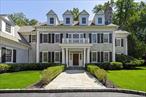 Welcome to 1 Cedar Lane, an elegant shingle-style Colonial nestled in the prestigious Purchase Estates. Set on a prime, level parcel at the end of a peaceful cul-de-sac, this exceptional 5-bedroom, 5 full bathroom/2 half bath home offers the ultimate in privacy and scenic beauty, backing up to 14 acres of protected natural preserve. A dramatic two-story entrance hall opens to sun-drenched living spaces with soaring ceilings, custom paneling, and exquisite millwork throughout. The gracious living room with fireplace, formal dining room, and butlerâ€™s pantry are perfect for entertaining, while the hand-painted library adds warmth and sophistication. A first-floor bedroom suite provides ideal flexibility for guests or multi-generational living. The finished lower level is a true highlight, featuring a 1, 500-bottle wine cellar along with expansive space for recreation and relaxation. Classic and refined, this home defines luxury living in one of Westchesterâ€™s most coveted communities.