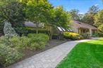Welcome to this spacious and airy ranch located in the charming Village of Poquott. This unique waterfront community offers residents a wide array of amenities, including tennis courts, parks, playgrounds, kayak racks, community gardens, picnic areas, private beaches, 24/7 private security, and dock and mooring rights. This ranch has been perfectly updated with a new roof, Renewal by Anderson windows and doors, vinyl siding, paver walkways, multiple decks, and lush landscaping.Ideally situated on the North Shore, Poquott is nestled between Port Jefferson and Setauket Harbors, offering a rare blend of peaceful coastal living and convenient access to nearby attractions. It is just minutes from Stony Brook University and Hospital, and close to the picturesque Villages of Port Jefferson and Stony Brook. With its eclectic mix of converted summer cottages and elegant waterfront estates, Poquott is a truly special place to call home.