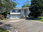 Expanded Hi Ranch with Wood Floors, Andersen Windows, 8 zone IGS, Family Room w/ Fireplace, Ductless and Central Air, Roof 7 years young, Sidewalks, Fenced Private Yard, Laundry on Top Floor, Quartz Open Eat in Kitchen, Gas Cooking and Gas Heat , Large Living Room with Sky High Ceilings, 200 Amp Electric, Desirable Commack Schools and MORE !
