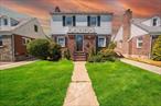 Welcome to this beautifully maintained 4-bedroom, 2-bath colonial nestled on an oversized 40x118 lot in the heart of Fresh Meadows. This rare gem perfectly blends traditional charm with modern upgrades, offering timeless appeal and 21st-century convenience.Step inside to find hardwood floors throughout, elegant crown moldings in every room, and a warm, wood-burning fireplace anchoring the inviting main living area. The home&rsquo;s showstopper is its spacious, oversized eat-in kitchen, outfitted with granite countertops, premium Jenn Air appliances, and a sleek new over-the-hood range installed in 2025.Enjoy year-round comfort with central air conditioning and two new split A/C units (2024) in the kitchen and first-floor bedroom. The finished basement offers flexible spaceâ€”perfect as a playroom, gym, home office, or guest suite.Outdoors, you&rsquo;ll find a private, fully fenced backyard ideal for entertaining or relaxing, plus a detached one-car garage and a 240V, 50-amp NEMA 14-50 EV charging outlet for eco-conscious convenience.This fully equipped smart home includes:Nest thermostatApp-controlled in-ground sprinklersSmart central A/CKeyless entryWireless alarm system (GSM network) with door/window sensorsFire alarmExterior front and back security cameras with motion-activated lightingLocated near major shopping, dining, multiple houses of worship, and express MQ buses to Manhattan, this home is also zoned for the top-rated PS/IS 178 (3Kâ€“8 under one roof).Donâ€™t miss this exceptional opportunity to own a well-appointed, smart-enabled home in one of Queensâ€™ most desirable neighborhoods.
