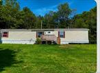 Liberty and Swan Lake area â€“ 3BR/1.5BA Mobile Home on 3 AcresCountry Living Meets Convenience â€“ Renovated 3BR/1.5BA Mobile Home in Swan Lake, NYMove-in ready 1996 mobile home offering 3 bedrooms and 1.5 bathrooms, situated on a peaceful 3.1 acre lot of agricultural land in Swan Lake. This well-maintained property features numerous upgrades, including:Roof replaced in 2022Updated electric service with new meterPrivate well with new pump, pressure tank, and water filtration system1, 000-gallon cement septic tank with filter outlet (installed 2019)2x6 exterior walls for enhanced insulation and energy efficiencyEnjoy the tranquility of country living with the convenience of nearby amenities. Located minutes from Bethel Woods Center for the Arts, Resorts World Catskills, and local shopping and dining. Ideal for year-round living or a weekend getaway.
