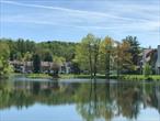 Accepted offer 8/19 Inspections scheduled 8/20 Showing for back-ups only.Discover exceptional living in this well maintained 2-bedroom, 2-bath townhome.A true gem within Chappaqua&rsquo;s coveted Old Farm Lake community. Enjoy lake views from your back deck or use the electric roller shades for the living room view. This unique unit boasts a front lawn, inviting patio, and lush landscaping overlooking a picturesque pond. The kitchen features new appliances, complementing the peace of mind offered by a new furnace and AC with whole-house air purifier. The master suite offers a walk-in closet and a spacious bathroom. The second bedroom features clever built-ins perfect for a desk space. The finished basement provides versatile bonus space for a home office or gym. Experience the best of Old Farm Lake at the club house, gym, pool, tennis courts, paddle tennis, basketball, and beautiful grounds. Close to shopping, schools, and highways.