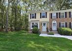 Welcome to Colonial Woods! This beautifully maintained end-unit townhouse-style condo offers the perfect blend of comfort, space, and privacy. Backing to the woods and featuring extra outdoor space along the side, this home provides a peaceful setting ideal for relaxing or entertaining. This unit has 2 bedrooms and 1.5 bathrooms, along with a full unfinished basement with high ceilingsâ€”perfect for storage or future finishing. The main level includes a bright eat-in kitchen and a cozy living room, while upstairs, one of the bedrooms has a large walk-in closet. With plenty of closets throughout, storage is never an issue. Recent updates within the past seven years include a new roof, windows, hot water tank, heat pump, central AC, washer and dryer, and paver patio in the backyard. Enjoy the amenities in Colonial Woods, including a clubhouse, three in-ground pools of varying sizes, tennis and basketball courts, scenic nature trails, and more. Donâ€™t miss the opportunity to own this move-in ready end unit in a sought-after community!