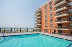 Oceanfront 2-Bedroom, 2-Bathroom Furnished Apartment for RentCompletely renovated with high-end finishes, this stunning furnished apartment offers direct oceanfront views from every room. Features include stainless steel appliances, in-unit laundry, and an assigned parking spot. Enjoy a spacious private balcony perfect for relaxing or entertaining. The building includes an in-ground pool and a large outdoor deck overlooking the water. Take in breathtaking sunsets from your own private terraceâ€”coastal living at its finest.Furnished seasonal winter rental available from September 15th to June 15th.
