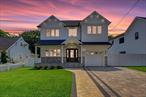 Experience luxury and modern elegance in this brand-new construction 3400+ Sqft home in East Meadow, plus a 1, 600+ sq. ft. Unfinished basement and a 1-car garage. Boasting hardwood floors throughout, Large Primary Bedroom Ensuite w/WIC and Vaulted Ceilings, Additional 2nd Floor Junior Suite, Ground Floor Junior Suite, Total of 4.5 modern bathrooms. Great Room with Electric Fireplace and Vaulted Ceilings, Sliders to Pavered Patio, custom designed kitchen with 10 Ft. center island, quartz countertops, stainless steel appliances, Gas Cooking, tile backsplash and more. Gas Heat & Navien Boiler with 2 zone heating system and Hw tank, Energy Efficient 2 Zone CAC system, Spray Foamed Attic, Professionally landscaped, Fully Pavered Patio & PVC Fenced Yard, All New Sod, 8 zone irrigation system, Pella Windows, BlueStone Front, Fully Pavered Driveway, Blocks from Parkway Elementary School, Close to Parkways, Shopping, and So Much More!